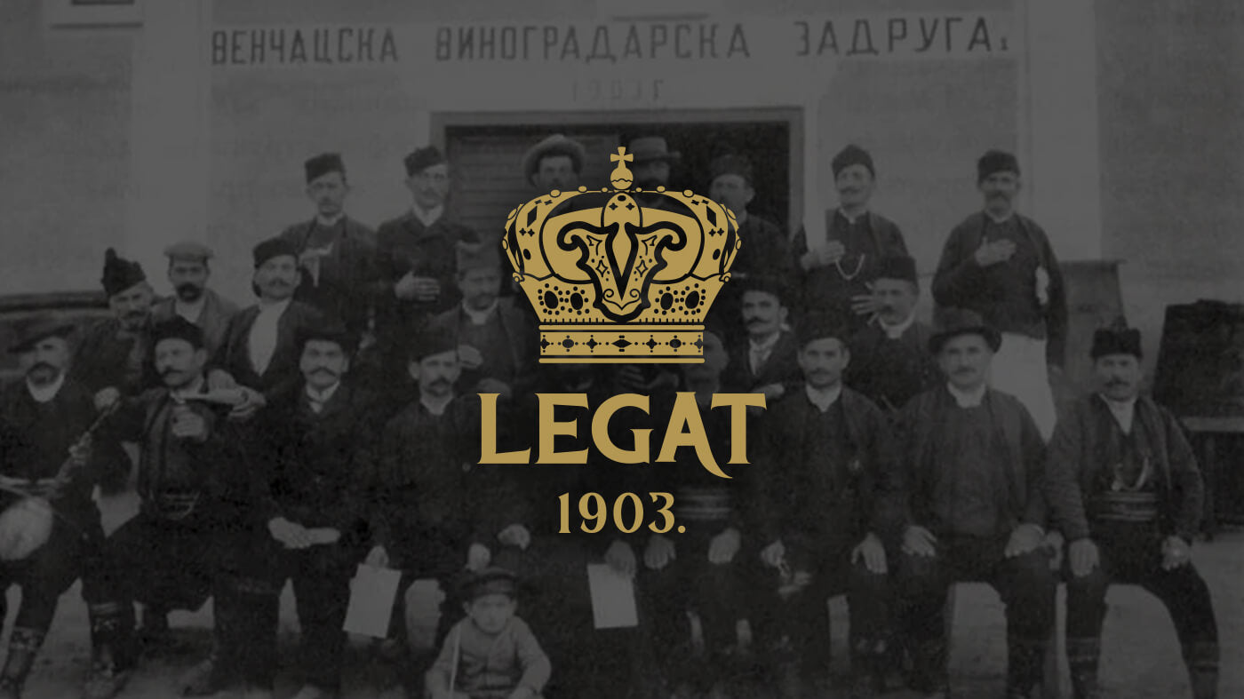 Historisches Gruppenbild und Markenzeichen von Legat 1903