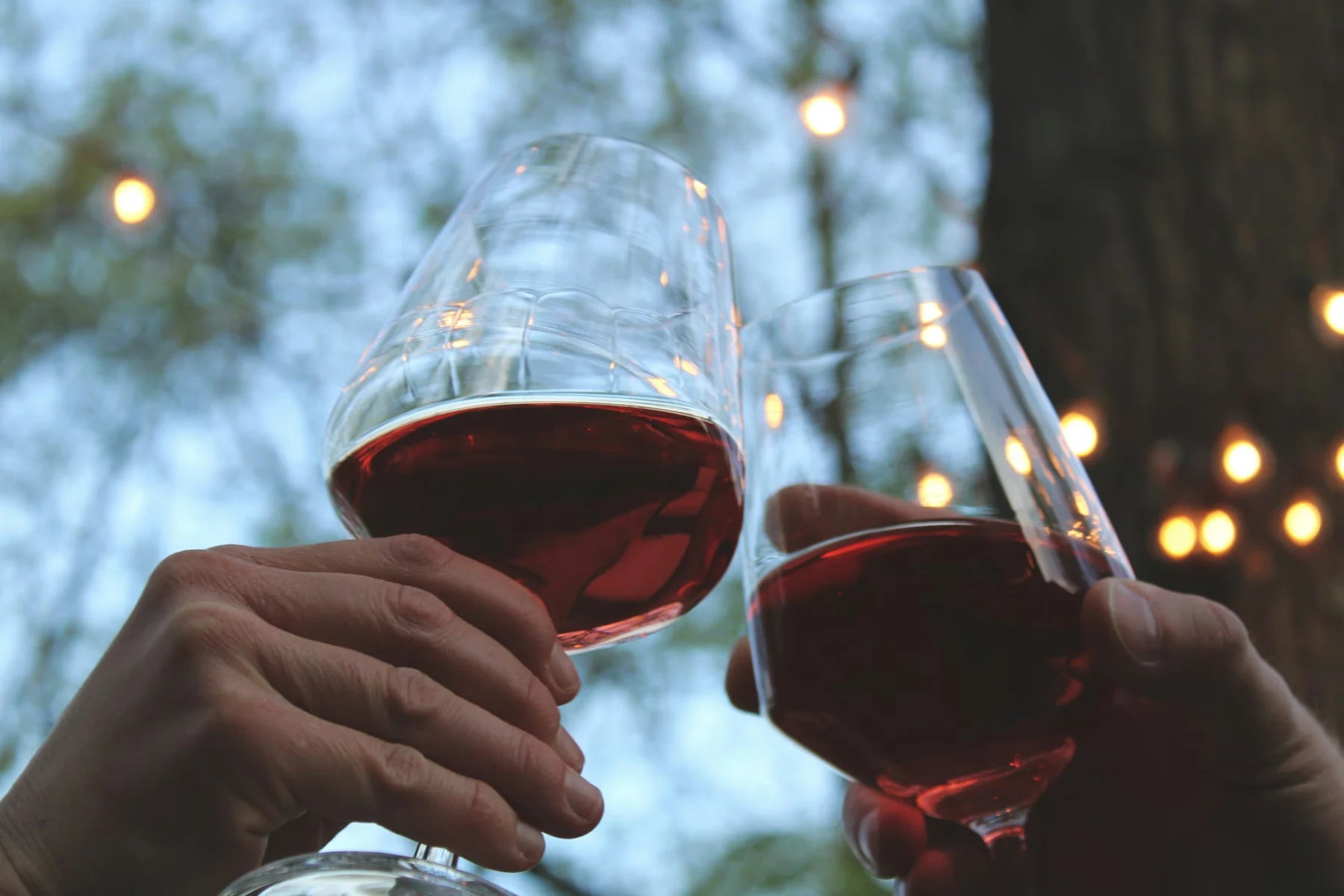 Wine glasses outdoors in the evening light
